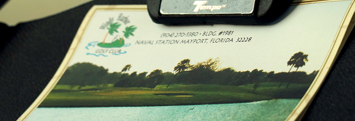 notice on golf cart with Windy Harbor Golf Course name and address