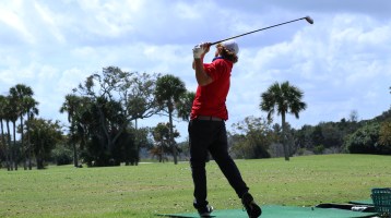 Tee Times - image of golfer on driving range